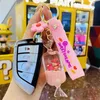 Keychains Creative Candy Drifting Bottle Into the Oil Girl Keychain Cute Student Men Women Bag Car Pene Par Festival Gift Keyring T220909