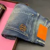 Höhere Version Herren-Jeans, Freizeithose, Designer-Hose, Buchstaben-Stickerei, modischer Knopfzugang, Herren-Shorts