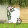 Decoratieve bloemen bruiloft boogdeur slinger hangende krans achtergrond rekwisieten met groene bladeren