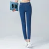 Kvinnors jeans elastiska hög midja mager mode kvinnor svart blå ficka mamma smal fit stretch denim byxor 4xl 5xl 6xl 221121