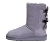 2022 designers australiska snöstövlar kvinnor klassiska med päls skor kvinnor vinter båge knä höga sneakers boot s2