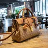 Magasins Sacs de conception en gros Prix ​​bas Prix d'été pour femmes Nouveau fourre-tout polyvalent à une épaule Mode Super Fire High-grade Sense Portable Messenger