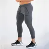 Survêtements pour hommes exercice pantalons de jogging serrés en cours d'exécution fitness musculation coton poches à glissière 221122