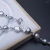 Anhänger Halskette 10-12 mm barock grauer Perlenkette mit Blattverschluss Elegantes Keshi