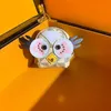 Modedesigner Schlüsselanhänger für Frauen floraler Druckbalken Schlüsselbund Kinder Süßes Owl Bag Anhänger Ohrhörer Wechseln Sie Aufbewahrungstaschen