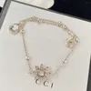 10 % RABATT 2023 Schmuck Anhänger Blume Doppel Strass Halskette Messing Minderheit Mode vielseitige Pullover Kette