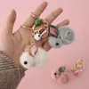 Cartoon Faux Pur Plexush Rabbit Keychain fofo de lã Felta de morango de pelúcia de pelúcia para keyring women carteira ornamentos gif