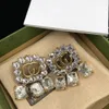 2022 Charmörhängen Mode Lyx Märke Designer Klassisk Diamant Dubbel G Bokstav CZ Tofs Lyxörhänge för kvinnor Bröllopsfest Lyxiga smycken med ask och stämpel