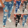 Projektantka Sexy Women Hole dżinsy 3xl Tassel Slit Denim Pencil Spodnie swobodne proste spodni modny 2023 trendy