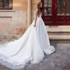 Abito da sposa a trapezio senza schienale con immagine reale, senza maniche, con applicazioni in pizzo, scollo a V, abito da sposa, tulle glitterato