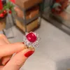 Designer di anelli di lusso da donna Anello a fascia con smeraldo in argento sterling con diamante superiore per le donne che si aprono per regolare il regalo di San Valentino per la festa di nozze