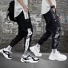 Мужские брюки 2022 Мужчины хип -хоп уличная одежда сплайсин