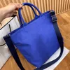 Prad Bags Borsa tote in tessuto Drill Borse a spalla classiche Lady Killer Shopping Borsa a tracolla Pelle Scritte in rilievo sul davanti Luxurys 4WC2