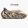 Sandalet slaytlar spor ayakkabı terlik ayakkabıları moda eğitmenleri kaydırıcı köpük koşucusu terlik grafiti kemik beyaz reçine çöl kum kauçuk yaz tasarımcısı plaj