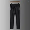 Männer Hosen 4XL Sommer Männer Eis Seide Tasche Casual Dünne Dünne Hosen Plus Größe Lose Streerwear Sport Joggings Laufende joggers