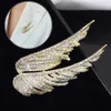 Broches ailes d'ange en strass pour femmes, broche à paillettes, plume, collier, broche de luxe, Corsage, nouvelle mode, décor de vêtements