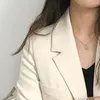 女性のスーツビジネスブレザーソリッドカラーカーディガンターンダウンカラーフラップポケットボタン装飾レディファッション2022女性ジャケットのための女性