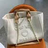 Bolsas de noite de luxo da moda Bola de lona Handbag clássica de pérolas de praia designer feminino fêmea grande mochila pequenas embalagens portáteis bolsas de compras e31t
