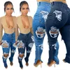 Nya Spring Autumn Womens Jeans Designer Populära trasiga hål Elastiska split denim Pants Kvinna