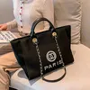 Bolsa de noite de luxo da moda Handbag clássica de banda de lona de praia de praia fêmea fêmea de mochila grande mochila pequenas bolsas portáteis de compras yo9a