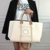 Bolsas de luxo da moda Bolsa de noite de luxo Chandbag clássica de pérola de praia designer feminina fêmea grande mochila pequenas embalagens portáteis bolsas de compras qwy5