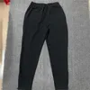 Pantalones de hombre Toalla azul Logotipo bordado Pantalones de chándal Hombres Mujeres Pantalones con cordón de alta calidad