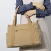 バッグデザイナートートバッグ女性ハンドバッグファッションマルチカラーチェーンキャンバス固体大容量汎用性の高いショルダーバッグバックルクロスボディバッグ