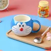 Doraemon Tumbler Ceramic Cup Cup Blue Fatty Fatty Children Machine Cate Coffe Coffs With Lid and Spoon 3EHG