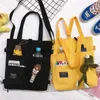 Bolsos de noche Bolso de lona con colgante para mujer Bolso de compras Correa para el hombro Libros Kawaii