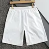 herrshorts lyxigt designermärke klassisk europeisk herrkort sport sommar Snabbtorkande ventilerande Bokstäver Tryckta bräda Strandbyxor grossist XL