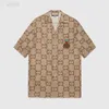 Camicie firmate di lusso Moda uomo Camicia da bowling con stampa geometrica Hawaii Camicie casual floreali Uomo Slim Fit Manica corta Tendenza varietà