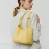 Sacs à main de créateur de luxe pour femmes Texture cuir sacs fourre-tout seau 2023 nouveau sac à bandoulière portable de mode haut de gamme ventes directes d'usine