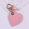 6 Cores de couro doce PU Heart Bowknot Cartoon Keychain for Women Triket Key Chains Ring Bag Saco de charme pendente de brinquedos infantis de961