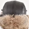 Bérets Chapeau D'hiver Pour Hommes Femmes Véritable Fourrure Oreille Cap Chaud Ski Unisexe Bomber Russie Chapeaux En Cuir À Garder