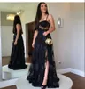 Robe de soirée noire A-ligne chérie étage longueur côté fente Spaghetti sangle dentelle Appliques dos nu élégant fête robe de bal