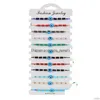 Bracelets de charme 12pcs/conjunto peru azul mal olho de olho mulheres mulheres feitas de corda artesanal Cristal Breads Bracelets Girl Party Jewelry Gift Dr Dhdic