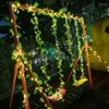 Fiori decorativi Piante artificiali Ghirlanda di edera Foglie di piante con luci a stringa a LED appese per camera da letto estetica Sala da parete per feste in giardino