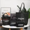 C classique blanc Logo maille sac à provisions designer luxe motif voyage sacs de lavage femmes stockage mailles étui