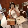 Luxury Designer Handbag Genuine Leather Lychee Pattern Platinum for Women 2022 New Fashion Large Capacity Portable High Grade Single Shoulder Factory Direct Sale