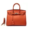 Ny huvudläderväska läder kvinnors handväska litchi mönster kvinnors en axel messenger väska