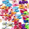 Vêtements pour chiens 20/50/100 pièces/ensemble cheveux fleur Pet arcs accessoires bandes élastiques chat décoration