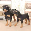 Simulazione in piedi coccola di cane nero coccole giocattoli super realistici per cani decorazioni per la casa oggetti di scena dei regali di Natale J220729