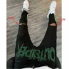 Nuevos jeans negros para hombres jogging retro cintura alta diezillos de diario de rehinestas flacas agujeros de diseño caliente estiramiento de pies pequeños pantalones de mezclilla lavados