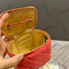 Frauendesigner Tiny Mini Lambskin Eitelkeitsbox mit goldenen Crush Ball Metall Crossbody Schulter Kosmetikkoffer Luxus Outdoor Sacoche Handtaschen 10 cm/17 cm