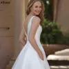 Semplici ed eleganti abiti da sposa in raso a linea con tasca con scollo a V pieghe Sexy backless Boho Garden Abiti da sposa Sweep Train Modern Robes de Mariee Plus Size CL1501