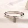 Europa Amerika Mode-Stil Armbänder mit Stahlsiegel Frauen Armreif Luxus Designer Schmuck 18 Karat vergoldet Edelstahl Hochzeit Liebhaber Geschenk Armreifen AA1180