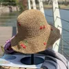 Chapeaux à large bord été chapeau de paille plage fleurs élégantes tissage seau pour femmes creux respirant Anti-UV voyage soleil