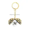 Nyckelringar Retro Guld Engelska bokstav Solros Locket Key Ring Ancient Initial Keychain Holders Bag Hang For Women Men Fashion Jewelr Dhuks