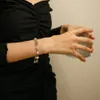 Новый дизайн браслет браслет-цепь Жемчужная полоса Flower G-буквы браслеты для женских универсальных модных дизайнеров дизайнера модных ювелирных изделий 1G1
