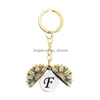 Nyckelringar Retro Guld Engelska bokstav Solros Locket Key Ring Ancient Initial Keychain Holders Bag Hang For Women Men Fashion Jewelr Dhuks